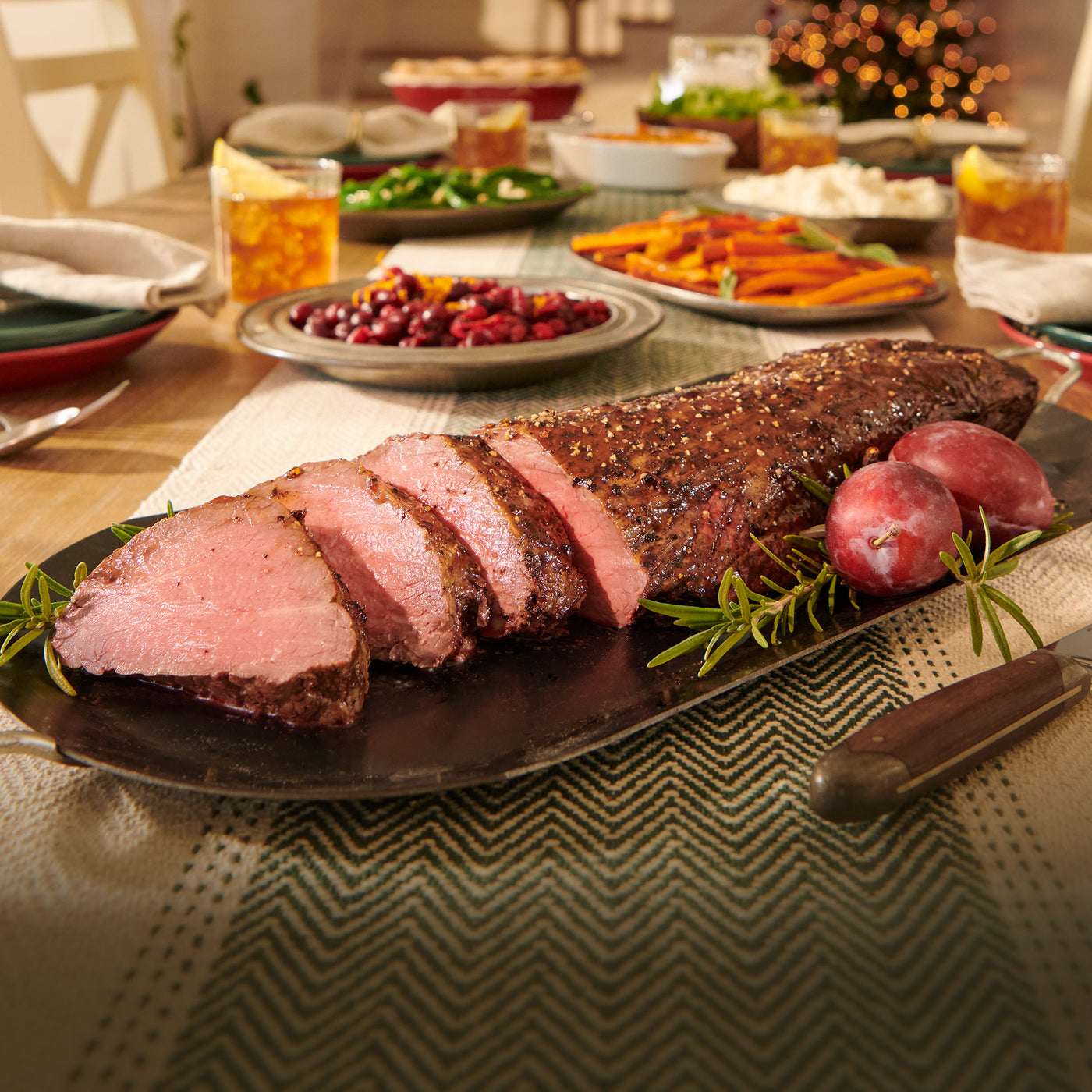 Fully cooked USDA Choice Black Angus smoked beef tenderloin from 44 Farms, hickory smoked and sliced for a holiday dinner centerpiece